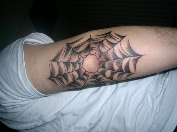 tattoos designs bows. spider web tattoos designs bow