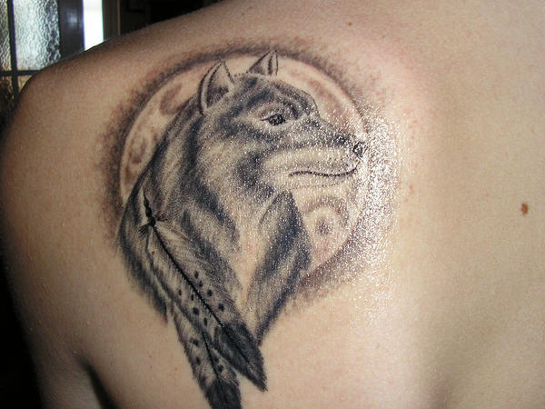 tribal wolf paw. wolf tattoos. tribal wolf