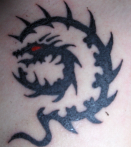 1988 The Year Of The Dragon - chest tattoo