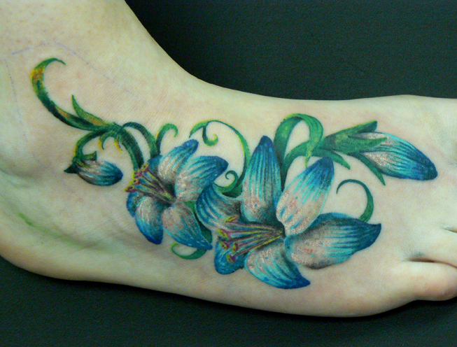 Flowers on foot tattoo | Flower Tattoo