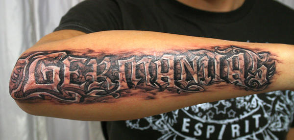 Stone Design Lettering Tattoo by 2Face Tattoo