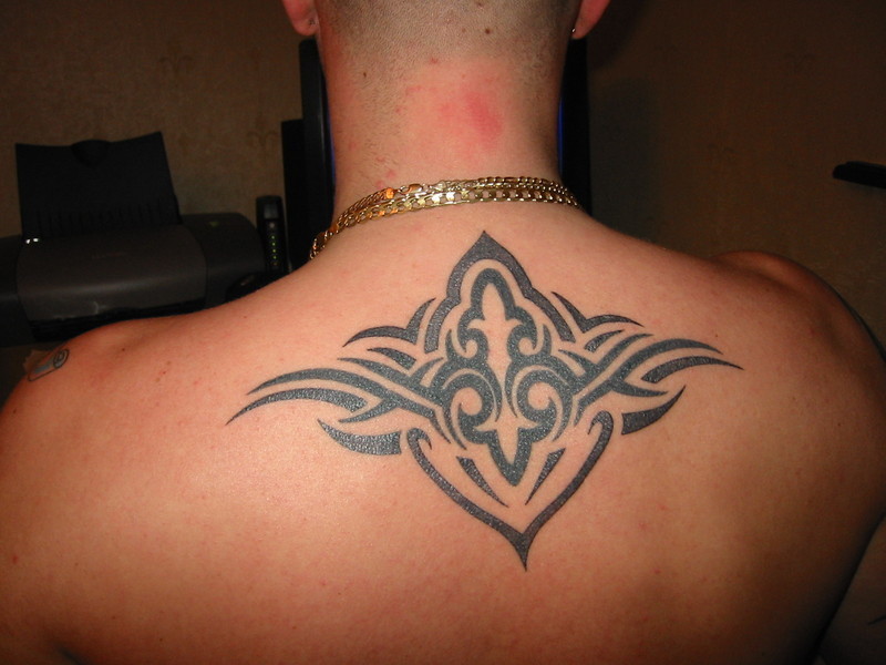 Tribal On Neck Tattoos