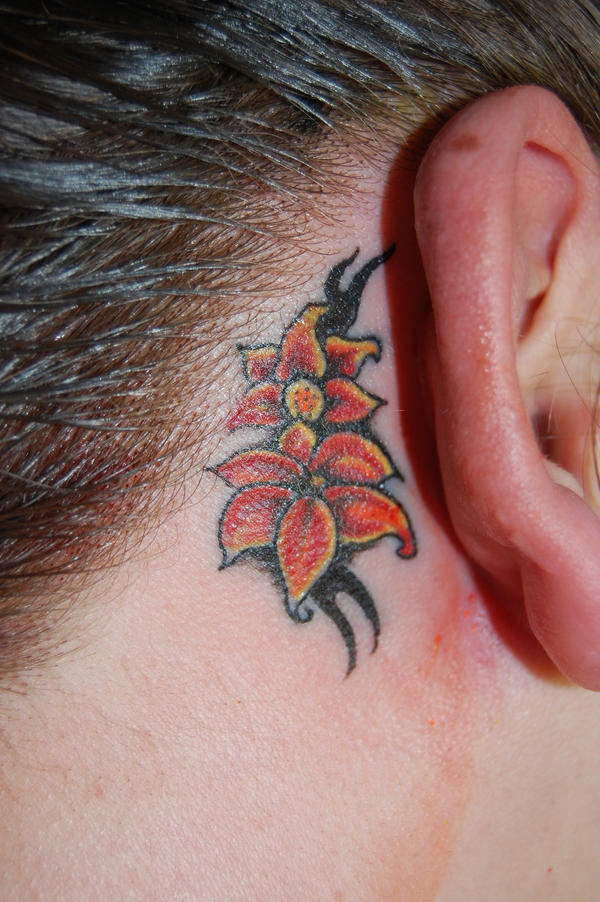 Flower ear tattoo by