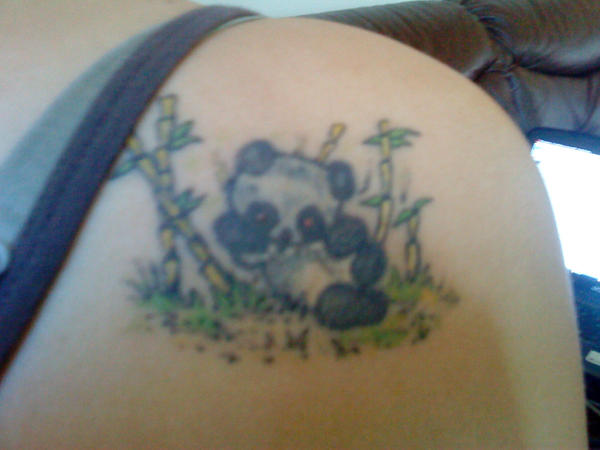 Fixed-up panda tattoo by .