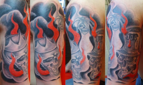 Half-sleeve skull tattoo - sleeve tattoo
