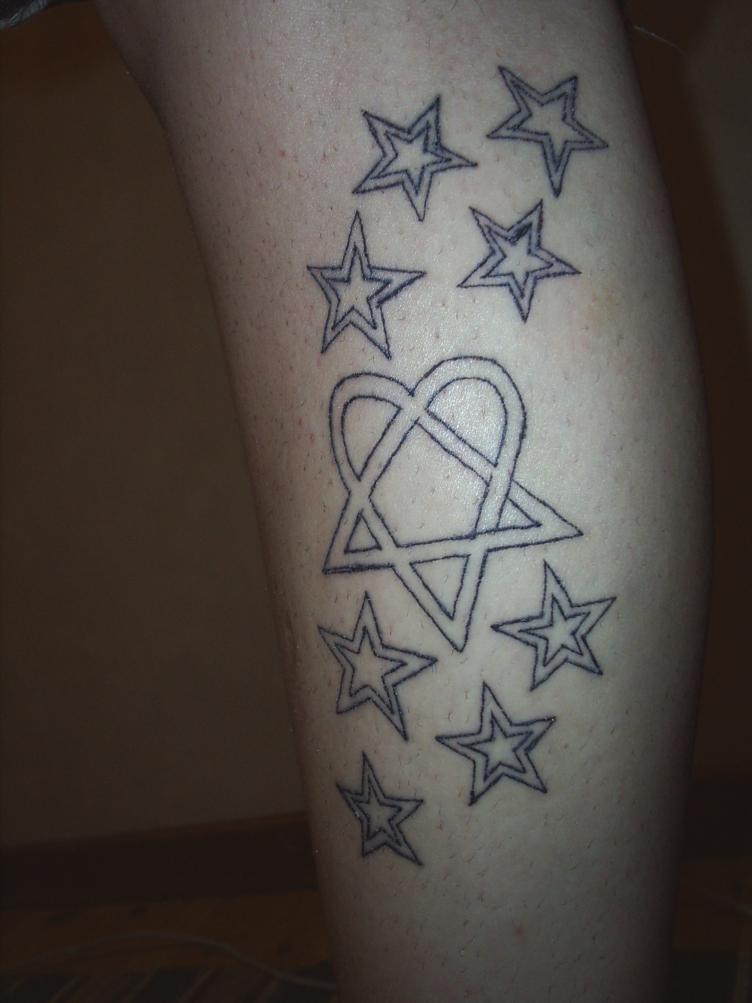 Heart and Stars leg tattoo by