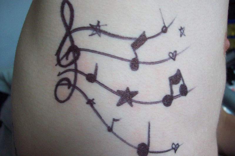 music note tattoos. Musical Notes Tattoo Design by