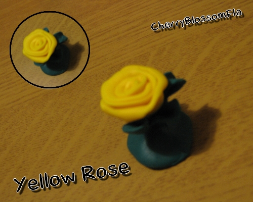 yellow_rose_by_nikuccia-d369bk5