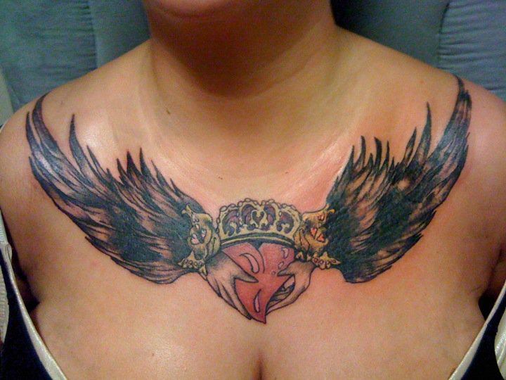 winged heart chest tattoo