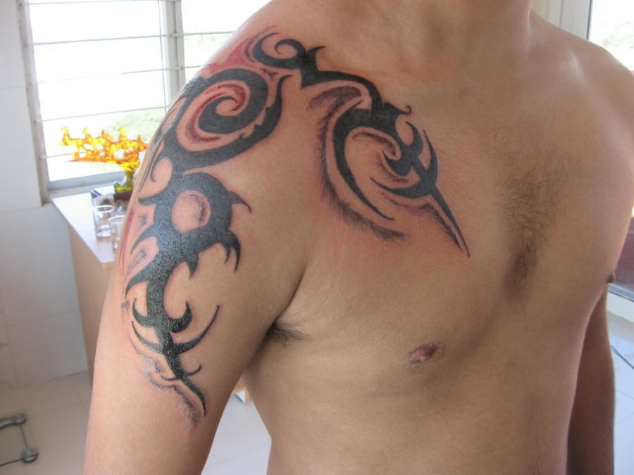 Tribal Tattoos Chest To Arm. hairstyles Tribal Tattoo Chest
