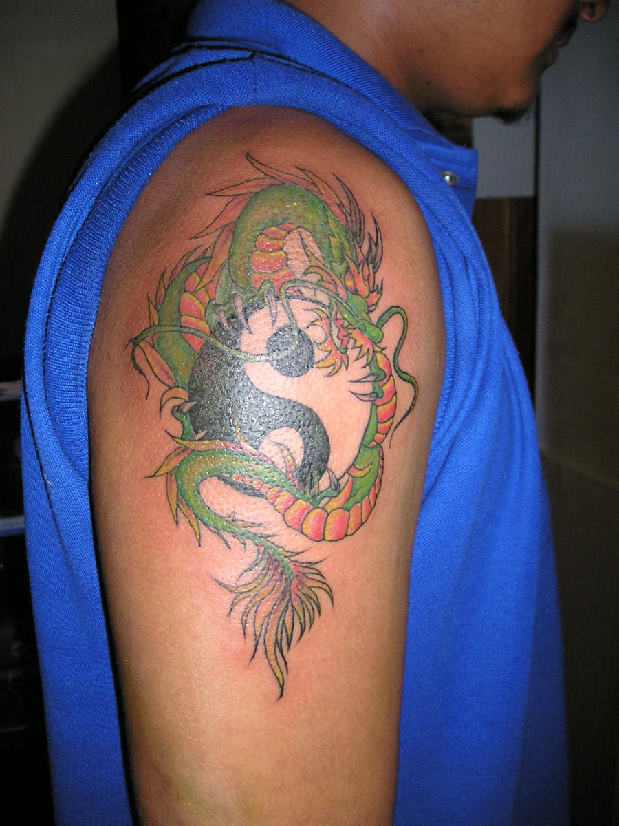 dragon tattoo by CraZyRaj on deviantART