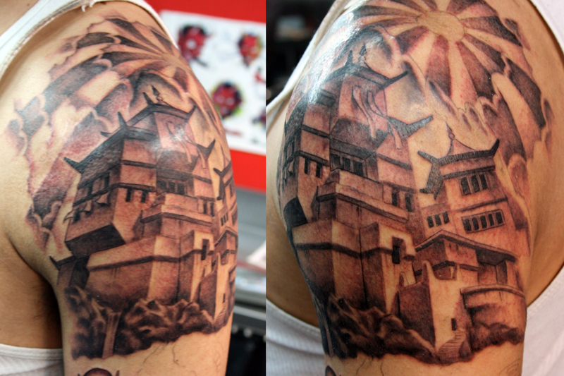 Temple tattoo on shoulder by