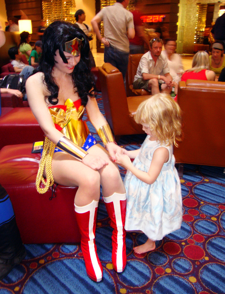 [Image: wonder_woman_and_small_fan_by_alisakiss-d2ytlle.jpg]