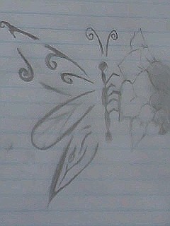 butterfly on a flower | Flower Tattoo