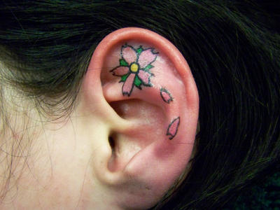 Ear tattoo by Shiva by